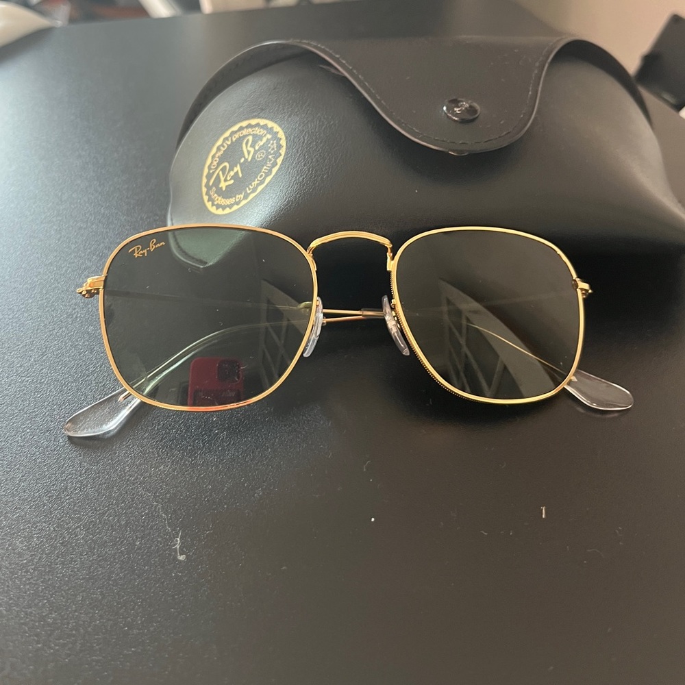 Gold and black Ray-Ban sunglasses